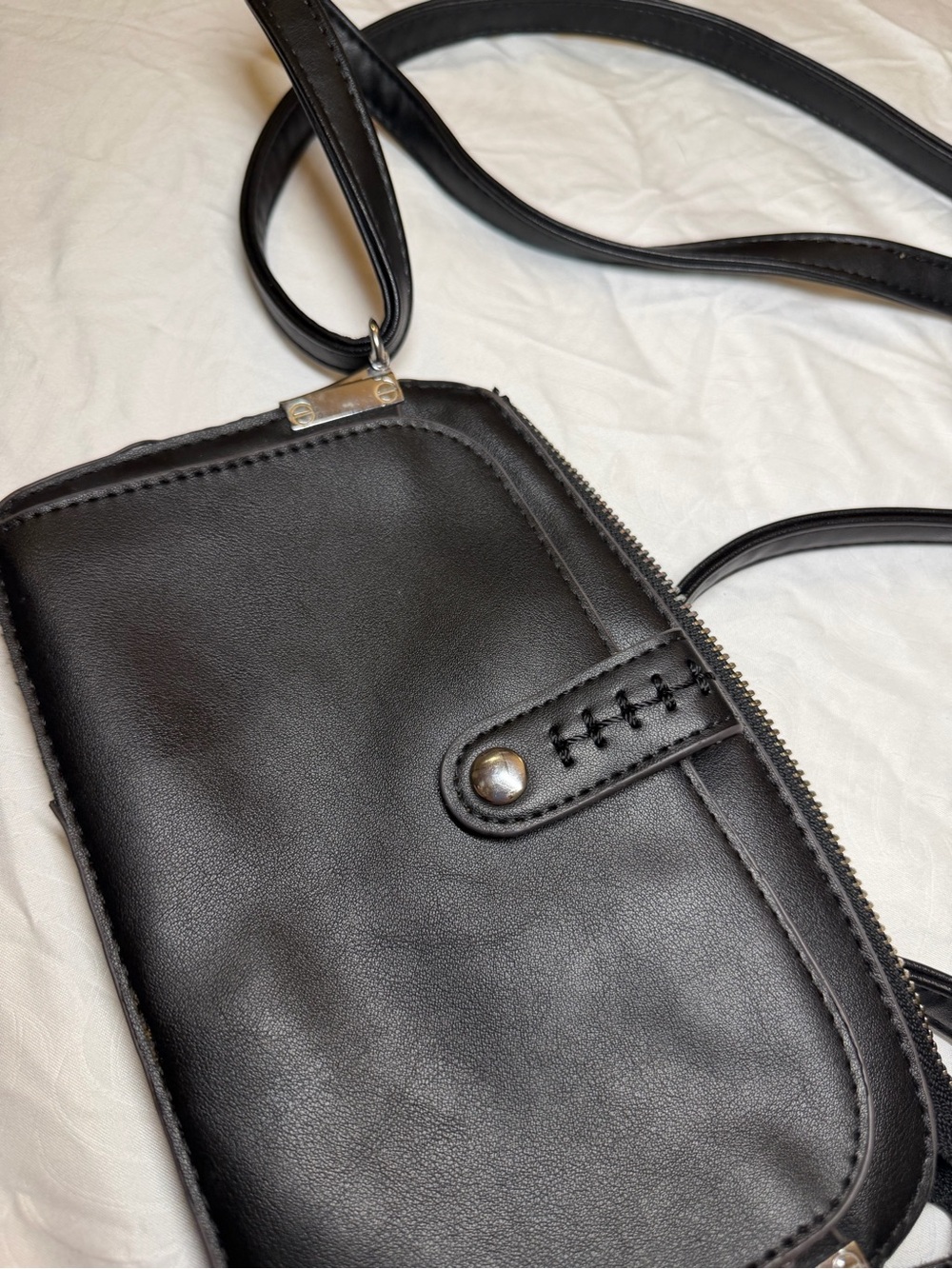 Black Leather Crossbody Bag with an adjustable strap